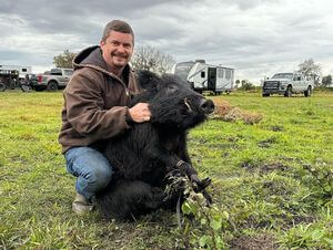 One of our guides, Matt, with a hog!